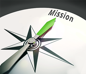2Lifts mission. Billede af en kompasnål, som peger på 'mission'.